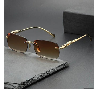 Óculos Masculino Cartier – Armação Dourada Sem Aro com Detalhe Jaguar