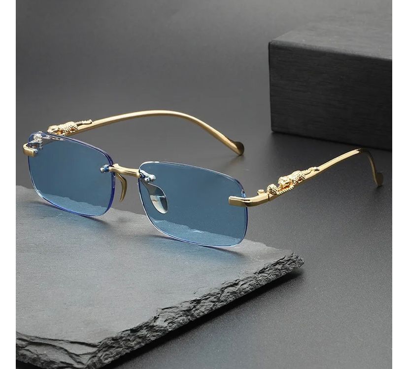 Óculos Masculino Cartier – Armação Dourada Sem Aro com Detalhe Jaguar