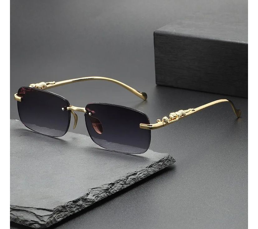 Óculos Masculino Cartier – Armação Dourada Sem Aro com Detalhe Jaguar