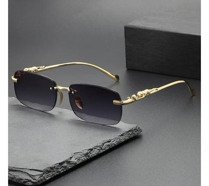 Óculos Masculino Cartier – Armação Dourada Sem Aro com Detalhe Jaguar