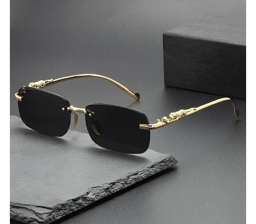 Óculos Masculino Cartier – Armação Dourada Sem Aro com Detalhe Jaguar