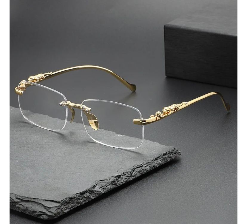 Óculos Masculino Cartier – Armação Dourada Sem Aro com Detalhe Jaguar